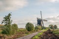 Dutch windmill in early morning sunlight