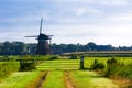 Dutch windmill landscape Royalty Free Stock Photo