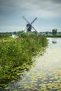 Dutch Windmill and landscape seen from Kinderdijk Netherlands Royalty Free Stock Photo