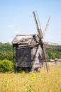 Dutch windmill. Landscape with traditional Ukrainian windmills houses in countryside village. Windmill mill at rural outdoor. Wind Royalty Free Stock Photo