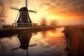 dutch windmill reflected in a calm water canal Royalty Free Stock Photo