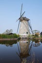 Dutch windmill reflected water