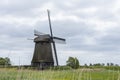 Dutch windmill to the left the image. Oterleek netherlands holland