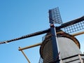 Dutch windmill in Willemstad. Dutch characteristic landscape for green energy. Royalty Free Stock Photo