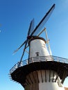 Dutch windmill in Willemstad. Dutch characteristic landscape for green energy. Royalty Free Stock Photo