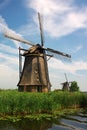 Dutch windmills in countryside Royalty Free Stock Photo