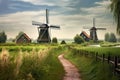 dutch windmills surrounded by lush green farmland Royalty Free Stock Photo