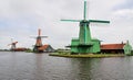 Dutch windmills on the Zaans river in Zaanse Schans, Netherlands Royalty Free Stock Photo