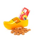 Dutch wooden shoe with presents and pepernoten Royalty Free Stock Photo