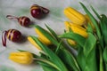 Dutch yellow tulips with decorative white red Easter eggs Royalty Free Stock Photo