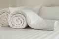 Roll the quilt apart on the bed. Royalty Free Stock Photo