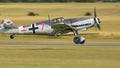 Gray Messerschmitt Bf 109 of German Air Force landing on the runway