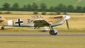 Yellow Messerschmitt Bf 109 of german air force landing on the runway