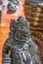 Dvarapala Guardian, Carved stone sculpture at Pura Tirta Empul temple.