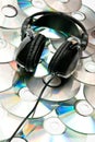 DVD background and headphones Royalty Free Stock Photo