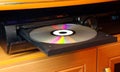 The DVD and CD are inserted in the DVD player. Royalty Free Stock Photo