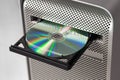 DVD CD ROM on a computer opened to show disc Royalty Free Stock Photo
