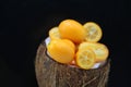 Dwarf bitter oranges served in the coconut