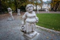 Dwarf Garden Zwergerlgarten - Dwarf with onions representing month of august - 17th century statue - Salzburg, Austria