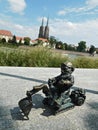 Dwarf riding on a digger, WrocÃâaw, Poland