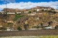 Dwellings houses into rock at Puerto Lumbreras and castle Royalty Free Stock Photo