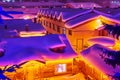 The dwellings with thick snow at night