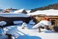 The dwellings in white snow and blue sky