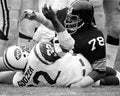 Dwight White tackles Emerson Boozer