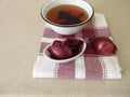 Dye agent, red decoction from red onion peel Royalty Free Stock Photo