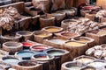 Dye reservoirs and vats in traditional tannery of city of Fez, Morocco Royalty Free Stock Photo