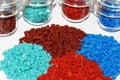 Dyed plastic granulate in test glasses