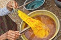 Dyeing silk. Using traditional natural materials Royalty Free Stock Photo