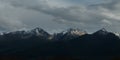 Dying sunlight on snow capped mountain peaks near Bokonbayevo, Kyrgyzstan, a popular centre for Community Based Tourism