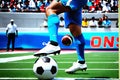 Dynamic Action: Man\'s Foot Hitting Football in Stadium Showdown