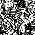 A dynamic black and white doodle pattern of overlapping dots, dashes, and diagonal lines Royalty Free Stock Photo