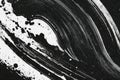 Abstract black and white paint strokes create dynamic movement and texture, showcasing artistic expression and creativity in a Royalty Free Stock Photo