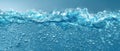 Dynamic Blue Water Surface with Effervescent Bubbles Royalty Free Stock Photo