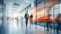 Dynamic business environment with blurred motion of people in bright modern office space Royalty Free Stock Photo