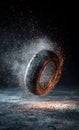 Dynamic Car Tire with Fiery Glow and Exploding Debris on Dark Background Royalty Free Stock Photo