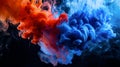 Dynamic close-up of red and blue acrylic paint clouds dispersing in water, creating an intricate abstract pattern with a Royalty Free Stock Photo