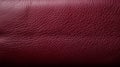 Dynamic Color Contrasts: Maroon Leather Texture Background