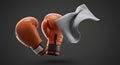 Throwing in the Towel - Boxing Gloves on Dark Background Royalty Free Stock Photo