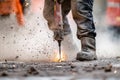 Dynamic construction work captured as a worker skillfully operates an electric jackhammer to break through concrete Royalty Free Stock Photo