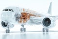 A dynamic 3D of a modern airplane with semi transparent elements, showing a view of its internal