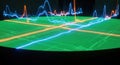 Dynamic Data Visualization: Oscillating Blue and Orange Waveforms on Green Grid Royalty Free Stock Photo