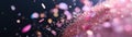 A dynamic display of multicolored sequins is scattered artistically across a clean black and pastel background, enhanced