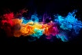 Dynamic flow of vibrant ink colors drops creating colorful smoke effect Royalty Free Stock Photo