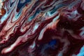 Dynamic fluid abstract with red, white, and blue flowing streaks. Artistic liquid pattern perfect for modern posters Royalty Free Stock Photo