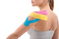 dynamic functional bandage with taping on female shouder isolated on white background Royalty Free Stock Photo