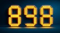 Dynamic glowing countdown timer displaying the number 898 in bright yellow lights, set against a Royalty Free Stock Photo